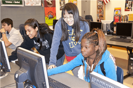 Students collaborating on computers