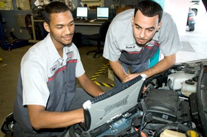 Students working on a vehicle